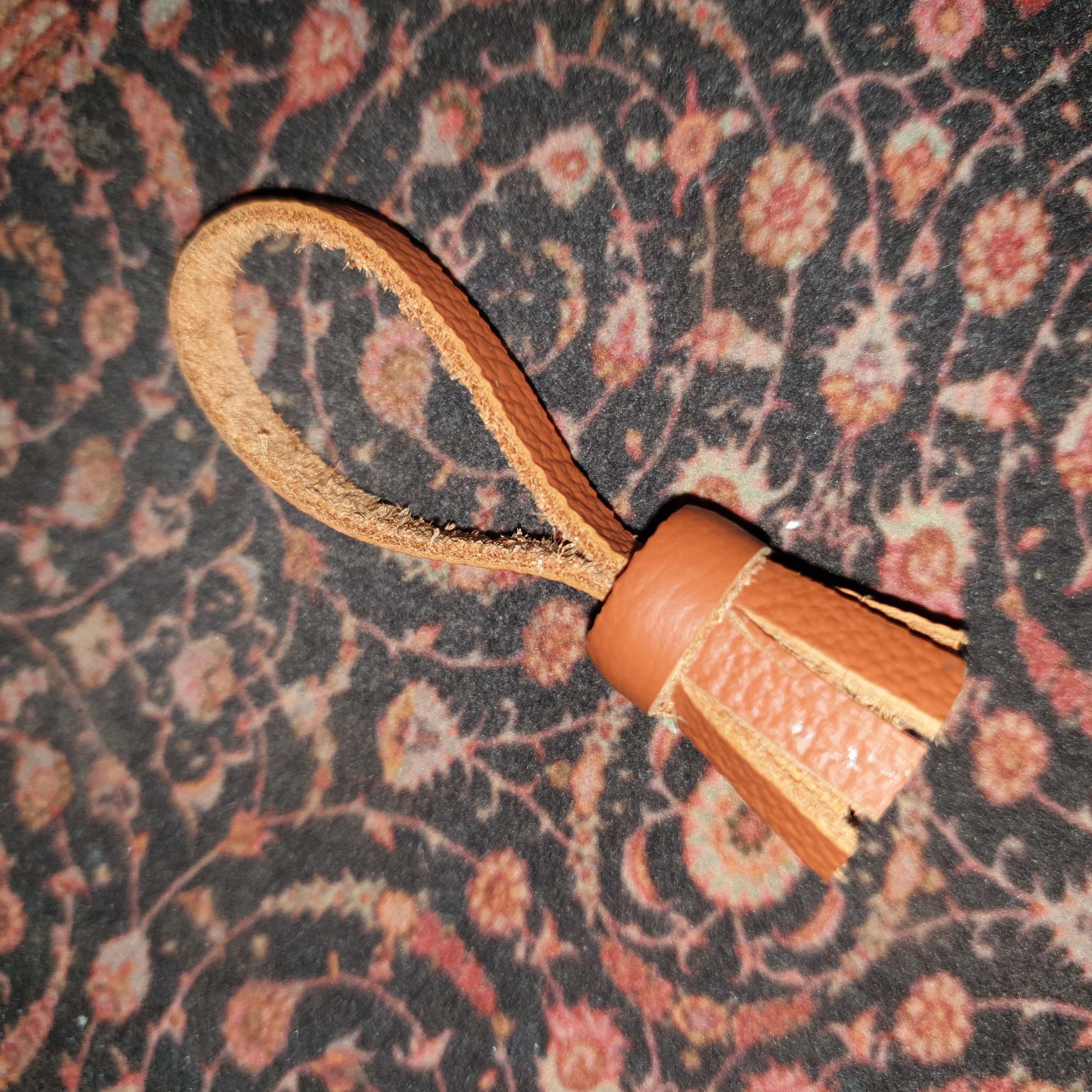 mini pompon en cuir v�ritable